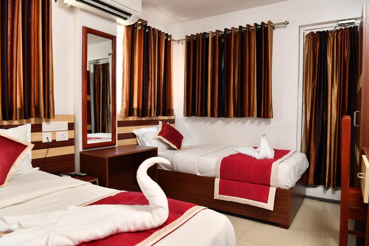 Oyo 18604 Puthens Capitol Inn Kochi 外观 照片